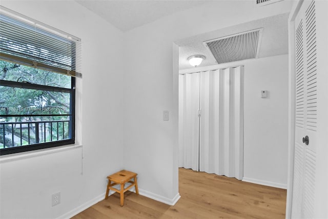 10501 W Broward Blvd Unit 304, Plantation, FL 33324 - unfurnished room featuring light wood-style floors and baseboards