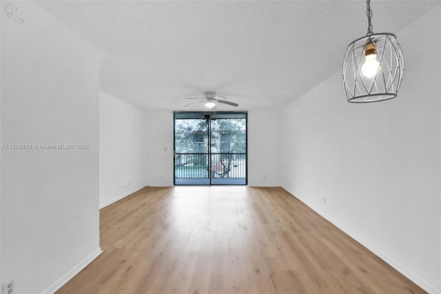 10501 W Broward Blvd Unit 304, Plantation, FL 33324 - unfurnished room with a ceiling fan and light wood finished floors