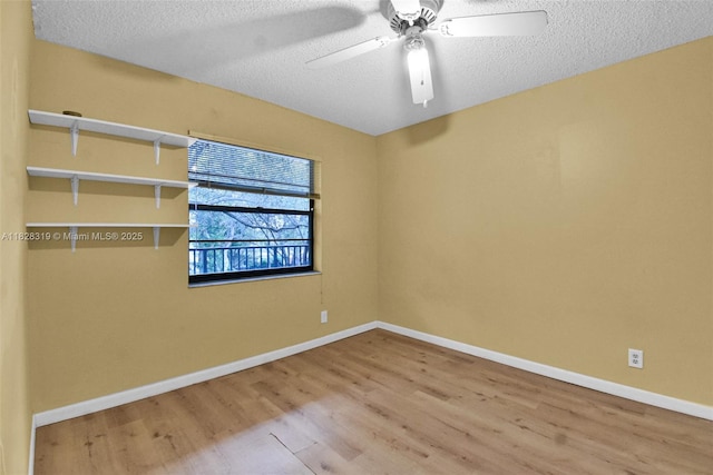 10501 W Broward Blvd Unit 304, Plantation, FL 33324 - unfurnished room with wood finished floors, a textured ceiling, and a ceiling fan