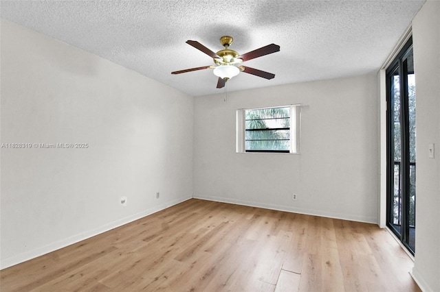 10501 W Broward Blvd Unit 304, Plantation, FL 33324 - spare room with wood finished floors, a textured ceiling, and a ceiling fan