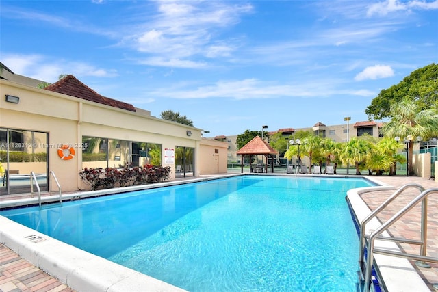 10501 W Broward Blvd Unit 304, Plantation, FL 33324 - community pool with a gazebo