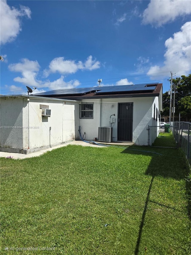 2237 NW 50th St, Miami, FL 33142 - rear view of property with solar panels