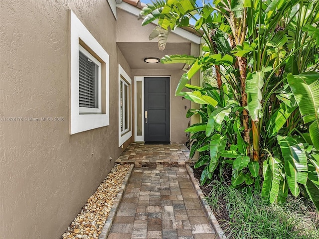 10370 NW 11th St, Plantation, FL 33322 - doorway to property featuring stucco siding