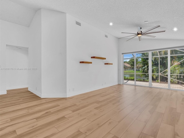 10370 NW 11th St, Plantation, FL 33322 - empty room with lofted ceiling, ceiling fan, light wood finished floors, a textured ceiling, and recessed lighting