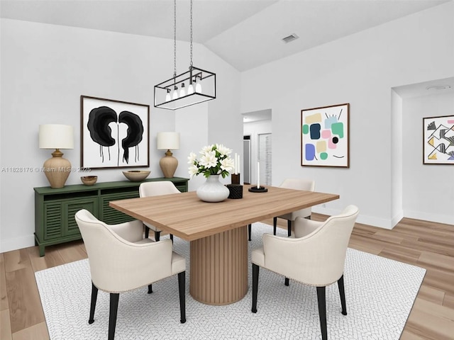 10370 NW 11th St, Plantation, FL 33322 - dining area featuring vaulted ceiling and light wood-style flooring