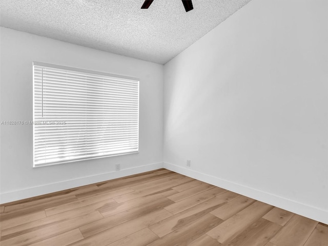 10370 NW 11th St, Plantation, FL 33322 - empty room featuring a textured ceiling, ceiling fan, and light wood finished floors