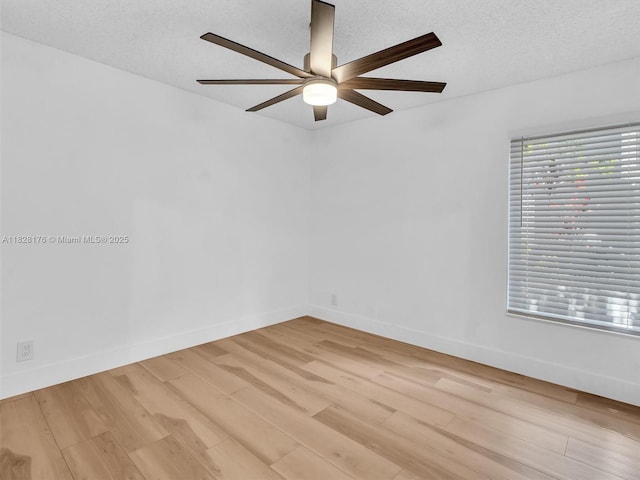 10370 NW 11th St, Plantation, FL 33322 - empty room with a ceiling fan, light wood-type flooring, and a textured ceiling