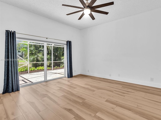 10370 NW 11th St, Plantation, FL 33322 - empty room featuring ceiling fan, light wood-style floors, and a textured ceiling