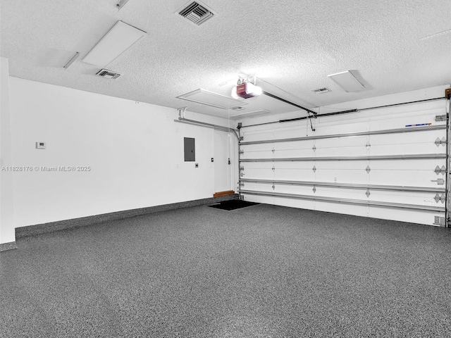 10370 NW 11th St, Plantation, FL 33322 - garage featuring a garage door opener and electric panel