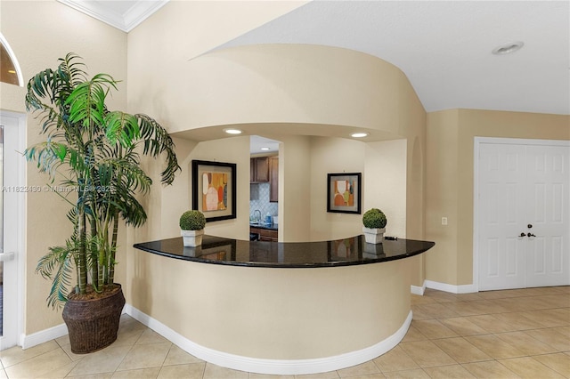 9052 Plymouth Pl Unit 9052, Tamarac, FL 33321 - reception with arched walkways, crown molding, and recessed lighting