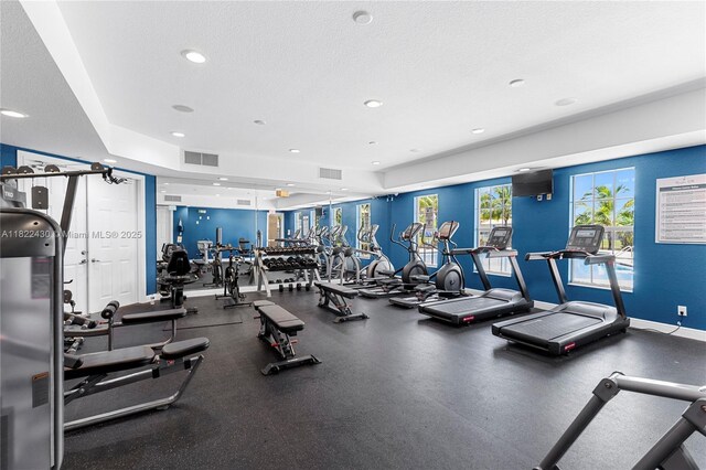 9052 Plymouth Pl Unit 9052, Tamarac, FL 33321 - gym with recessed lighting and a textured ceiling