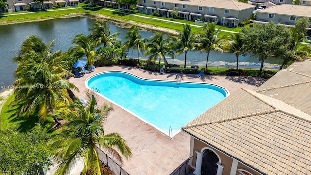 9052 Plymouth Pl Unit 9052, Tamarac, FL 33321 - community pool featuring a water view and a patio area