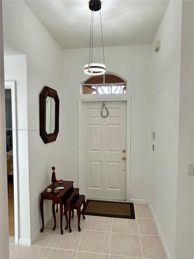 1084 Aspri Way, Riviera Beach, FL 33418 - foyer entrance featuring tile patterned flooring and baseboards