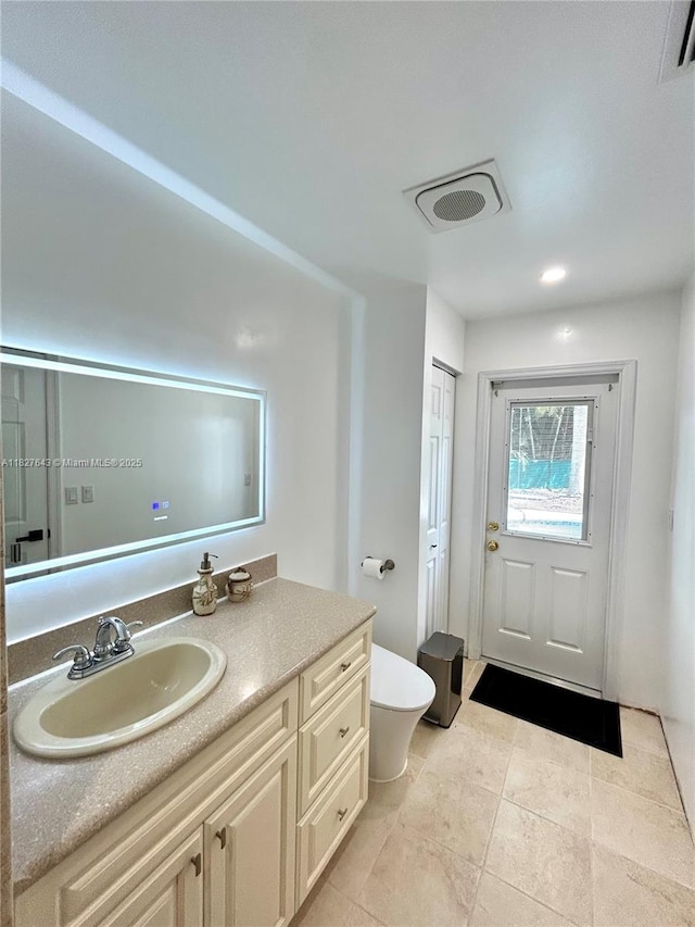 1084 Aspri Way, Riviera Beach, FL 33418 - bathroom with vanity and toilet