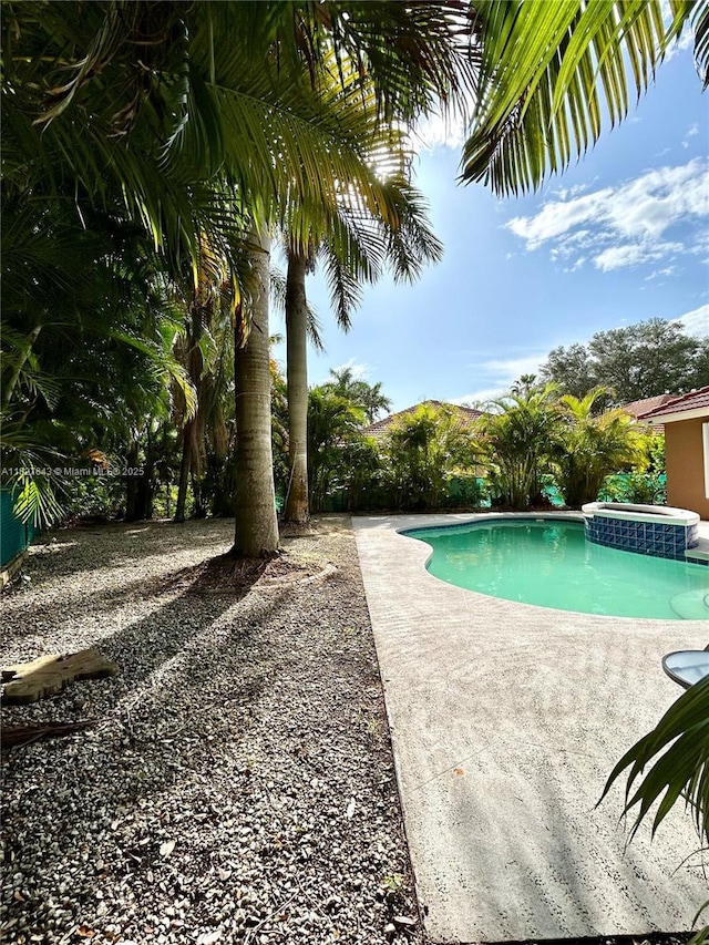 1084 Aspri Way, Riviera Beach, FL 33418 - outdoor pool featuring a patio area