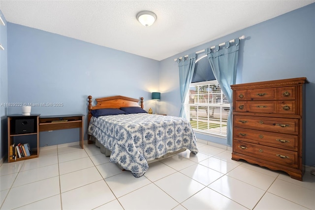 5143 SW 142nd Pl, Miami, FL 33175 - tiled bedroom featuring a textured ceiling