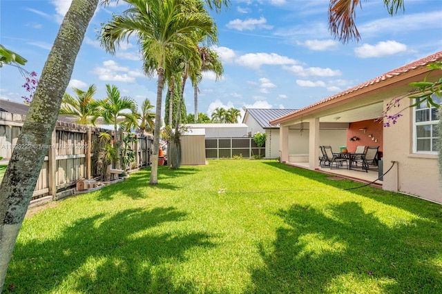 5143 SW 142nd Pl, Miami, FL 33175 - fenced backyard with a patio