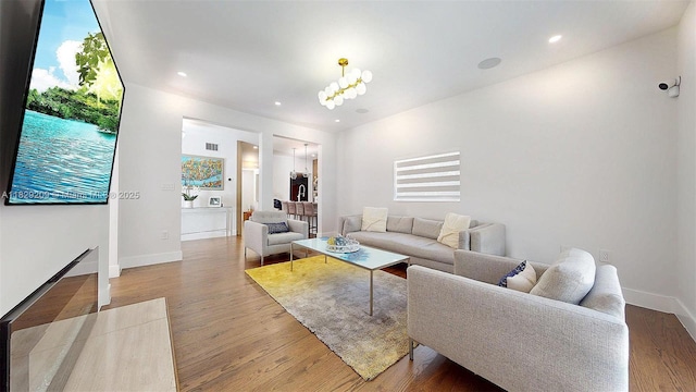 1222 Cortez St, Coral Gables, FL 33134 - living room featuring wood finished floors and recessed lighting