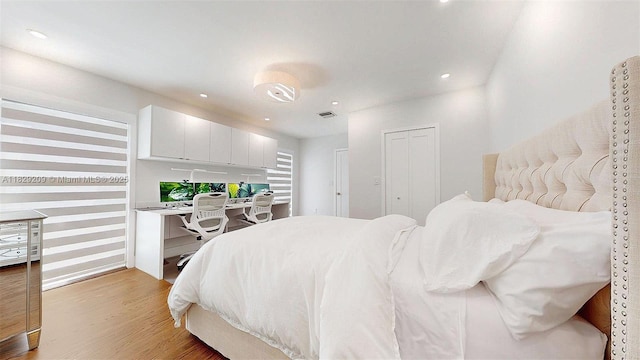 1222 Cortez St, Coral Gables, FL 33134 - bedroom with light wood-style flooring and recessed lighting