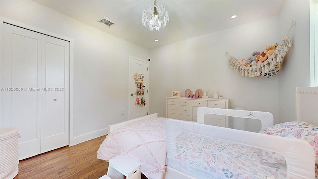 1222 Cortez St, Coral Gables, FL 33134 - bedroom with wood finished floors and recessed lighting
