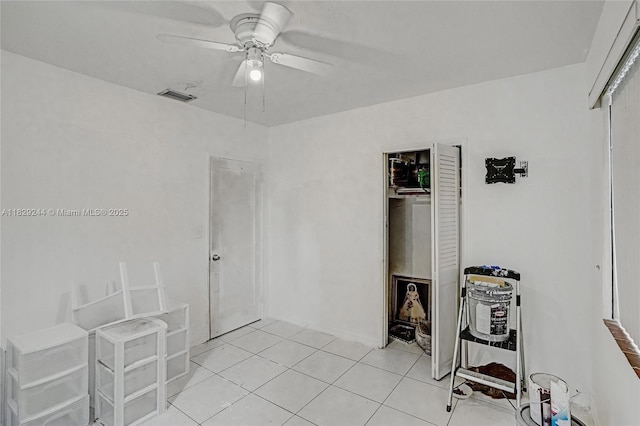 100 SW 67th Ct, Miami, FL 33144 - bedroom featuring a closet, light tile patterned floors, and a ceiling fan