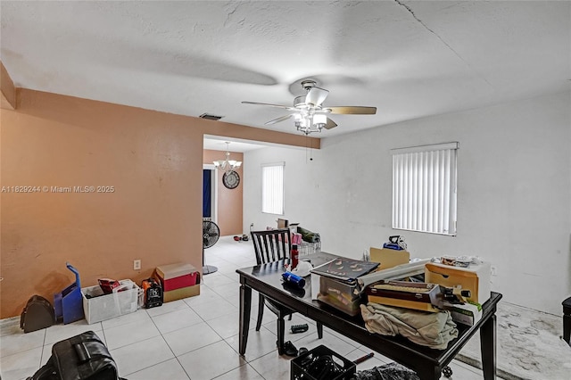 100 SW 67th Ct, Miami, FL 33144 - home office with a ceiling fan, a chandelier, and light tile patterned flooring