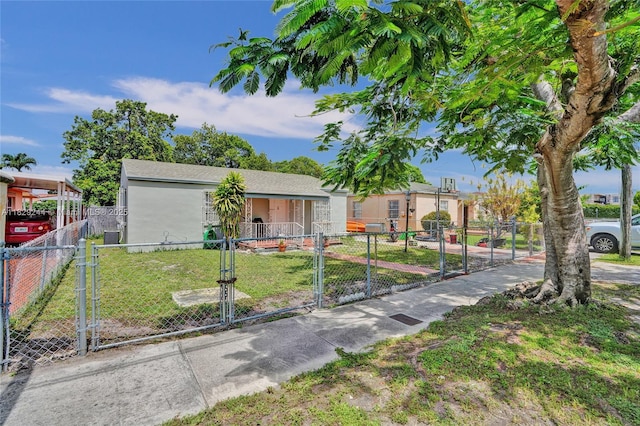 100 SW 67th Ct, Miami, FL 33144 - view of front of home featuring a gate, stucco siding, and a fenced front yard