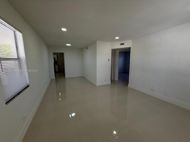 1494 W 34th St, Riviera Beach, FL 33404 - unfurnished room with recessed lighting and light tile patterned flooring