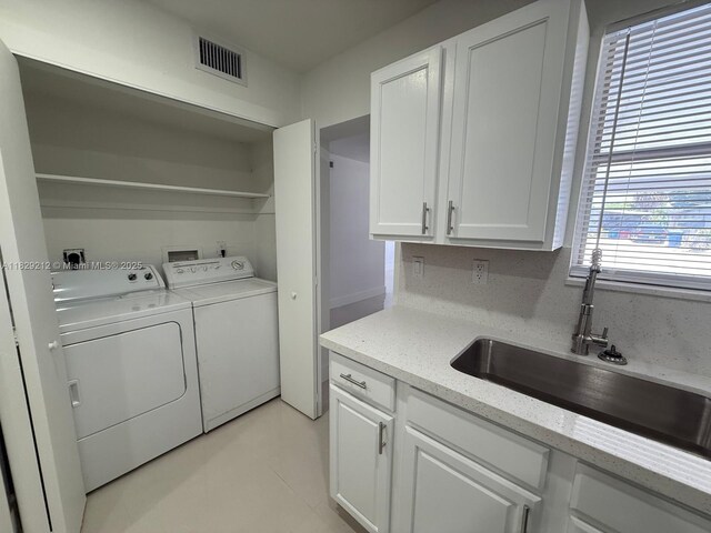 1494 W 34th St, Riviera Beach, FL 33404 - laundry area with washing machine and dryer