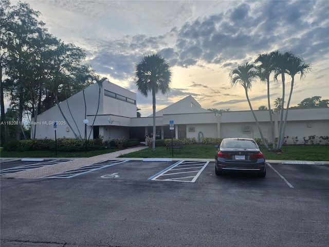 2541 Aragon Blvd Unit 105, Sunrise, FL 33322 - property at dusk with uncovered parking