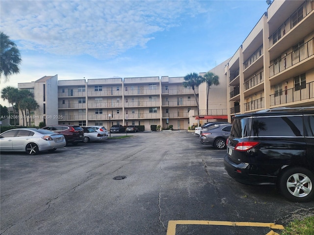 2541 Aragon Blvd Unit 105, Sunrise, FL 33322 - view of apartment building / complex featuring uncovered parking