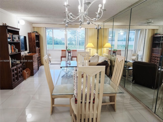 2541 Aragon Blvd Unit 105, Sunrise, FL 33322 - dining room featuring a chandelier and a textured ceiling