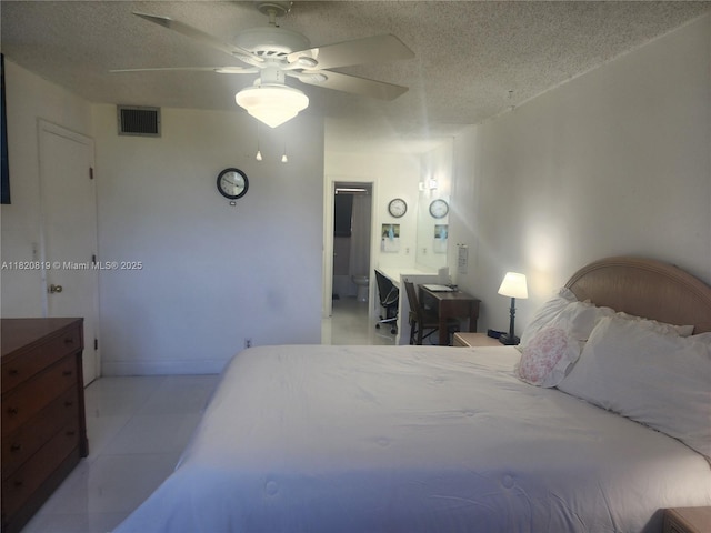 2541 Aragon Blvd Unit 105, Sunrise, FL 33322 - bedroom with a textured ceiling, ceiling fan, and light tile patterned flooring