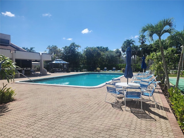 2541 Aragon Blvd Unit 105, Sunrise, FL 33322 - community pool with a patio area