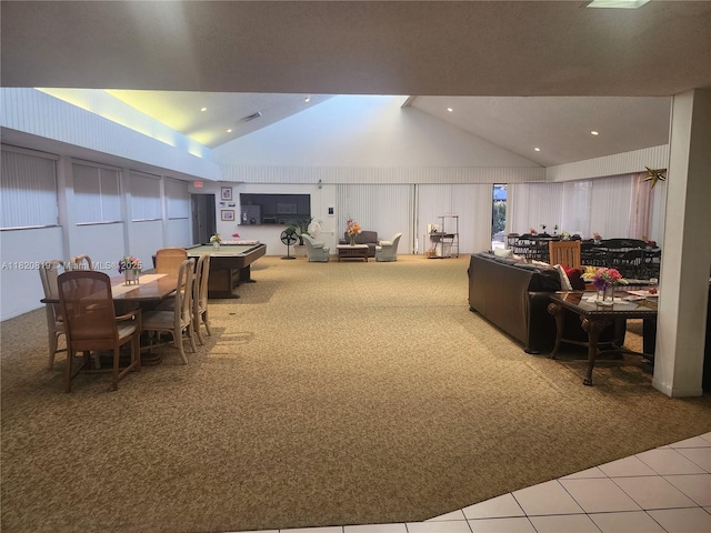 2541 Aragon Blvd Unit 105, Sunrise, FL 33322 - dining space featuring carpet floors, lofted ceiling, tile patterned flooring, and recessed lighting
