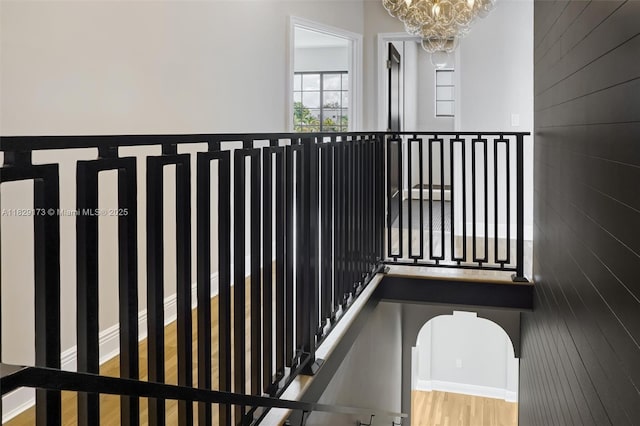 1145 SW 20th Ave, Miami, FL 33135 - staircase with a chandelier and wood finished floors