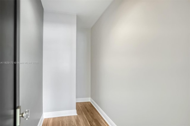 1145 SW 20th Ave, Miami, FL 33135 - empty room featuring light wood-style flooring and baseboards