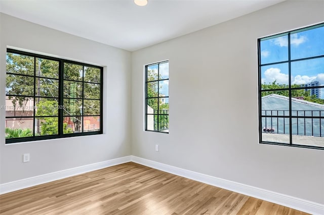 1145 SW 20th Ave, Miami, FL 33135 - unfurnished room featuring light wood finished floors
