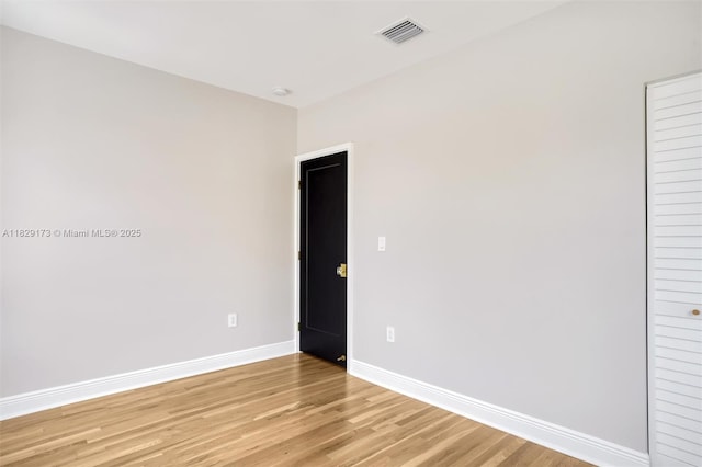 1145 SW 20th Ave, Miami, FL 33135 - spare room featuring baseboards and light wood-style flooring