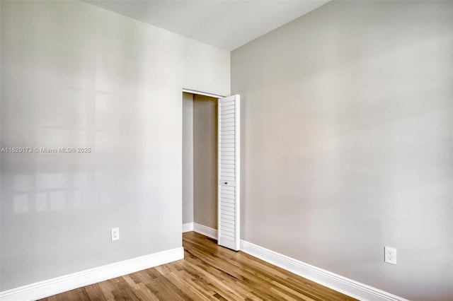 1145 SW 20th Ave, Miami, FL 33135 - spare room featuring baseboards and wood finished floors