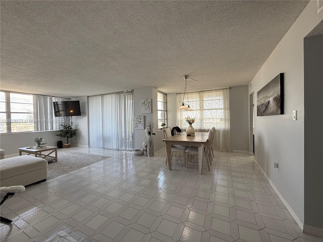 18011 Biscayne Blvd Unit 805, Aventura, FL 33160 - dining space with a textured ceiling