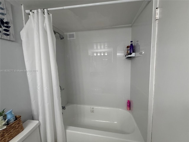18011 Biscayne Blvd Unit 805, Aventura, FL 33160 - bathroom with shower / bath combo with shower curtain and toilet