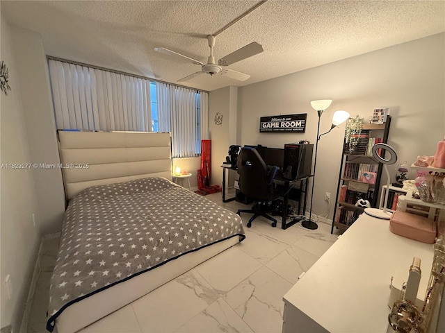 18011 Biscayne Blvd Unit 805, Aventura, FL 33160 - bedroom with marble look tile flooring, a textured ceiling, and ceiling fan