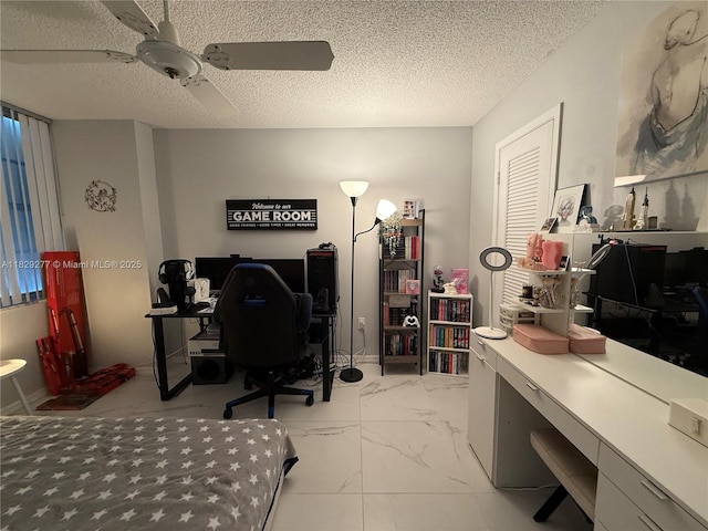 18011 Biscayne Blvd Unit 805, Aventura, FL 33160 - bedroom featuring a desk, marble look tiles, ceiling fan, and a textured ceiling