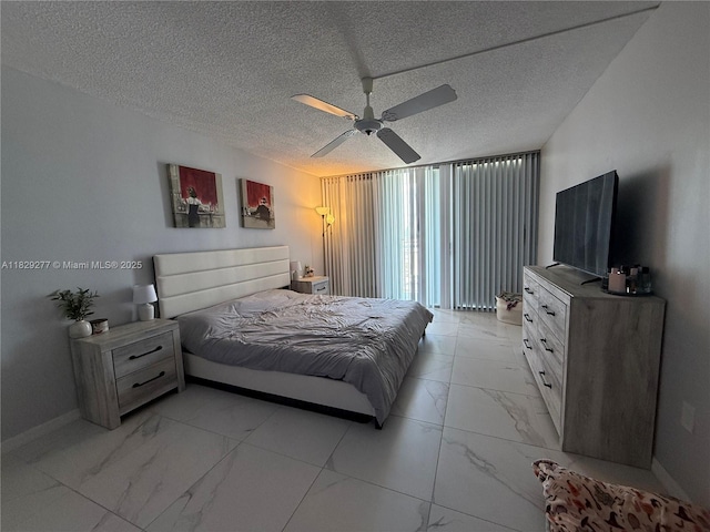 18011 Biscayne Blvd Unit 805, Aventura, FL 33160 - bedroom with light marble finish floors, a ceiling fan, and a textured ceiling