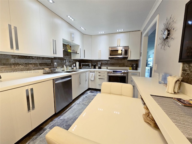 3071 N Course Dr Unit 107, Pompano Beach, FL 33069 - kitchen featuring appliances with stainless steel finishes, backsplash, light countertops, white cabinetry, and open shelves