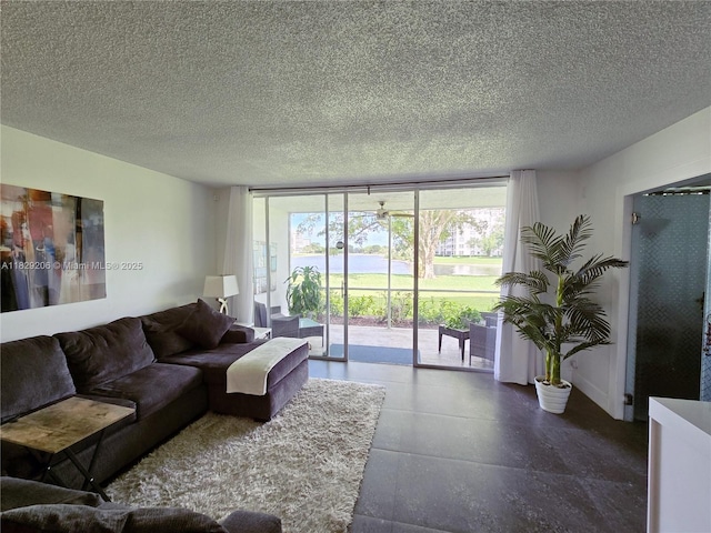 3071 N Course Dr Unit 107, Pompano Beach, FL 33069 - living area featuring floor to ceiling windows and a textured ceiling