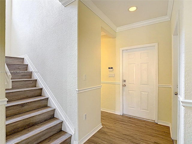 1568 SE 20th Ter, Homestead, FL 33035 - staircase featuring wood finished floors, ornamental molding, and a textured wall