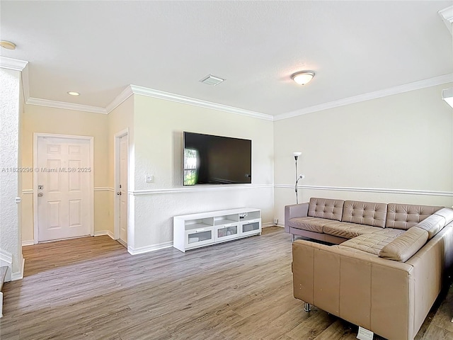1568 SE 20th Ter, Homestead, FL 33035 - living area featuring wood finished floors, ornamental molding, and recessed lighting