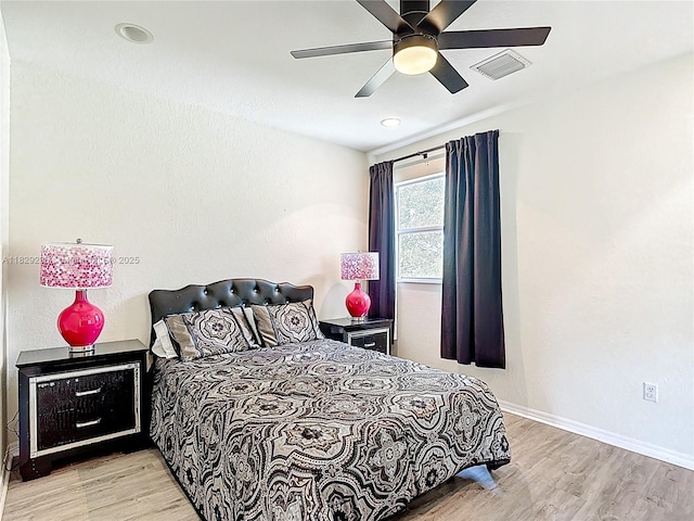 1568 SE 20th Ter, Homestead, FL 33035 - bedroom with wood finished floors and a ceiling fan
